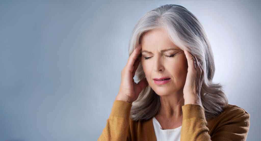 White middle aged woman having vertigo